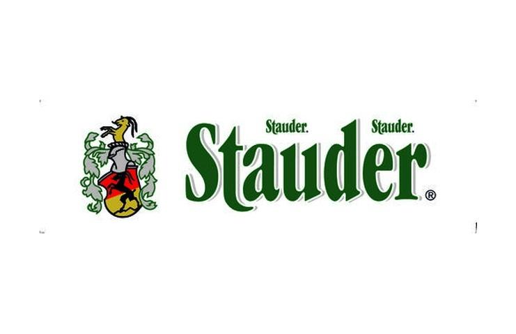 Logo der Marke Stauder mit einem Wappen und dem Schriftzug "Stauder" in grüner Schrift.